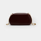 Chique Faux Leer Clutch met Stijlvolle Metalen Accenten