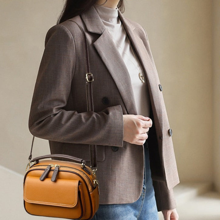 Schoudertas van synthetisch leer met compacte structuur - Mireille