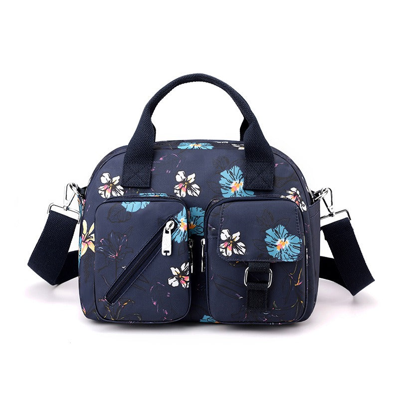 Damesschoudertas met meerdere vakken bloemenprint - Elora