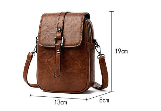 Schoudertas in synthetisch leer voor dames met compact voorvak - Daniela