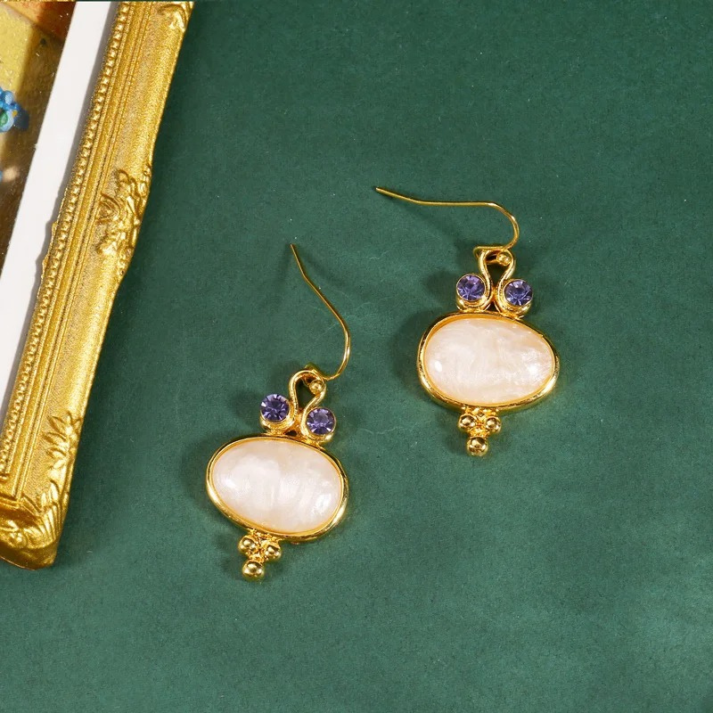 Ovale Mannenschijn Oorbellen - More