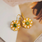 Gouden Bloem Oorbellen met Parels - Janni