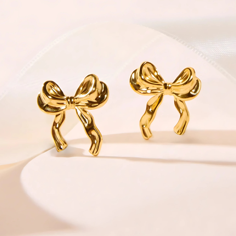 Gouden Strik Oorbellen - Lint