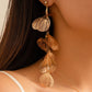 Luxe Lange Gouden Oorbellen met Bladvormige Hangers – Elegant Design