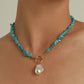 Reflecteer je stijl met de stijlvolle onregelmatige parelketting en groene turquoise
