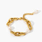 Elegante gouden armband met schakelketting en ovale parels