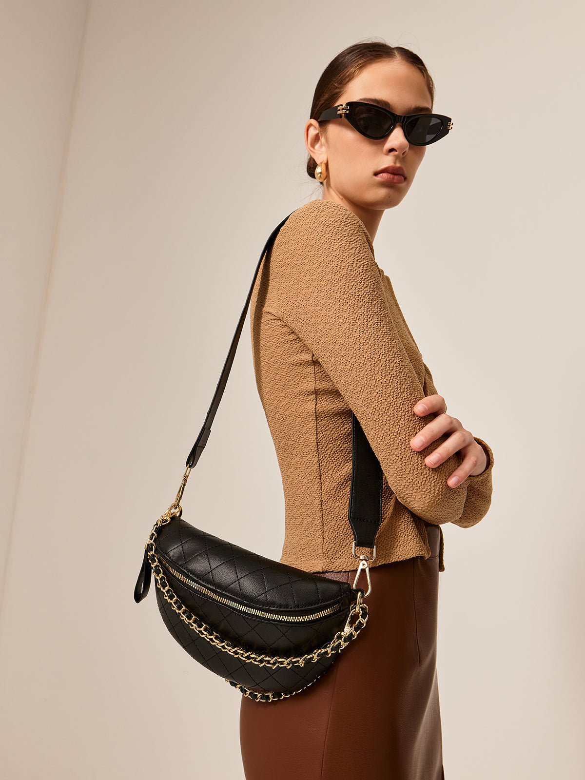 Decoratieve schouderriem met ketting en rits