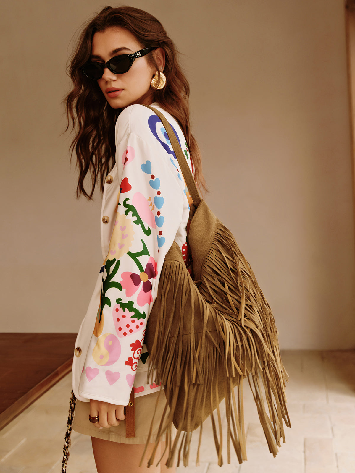 Boheme schoudertas met gesp-design en decoratieve kwast voor een stijlvolle uitstraling