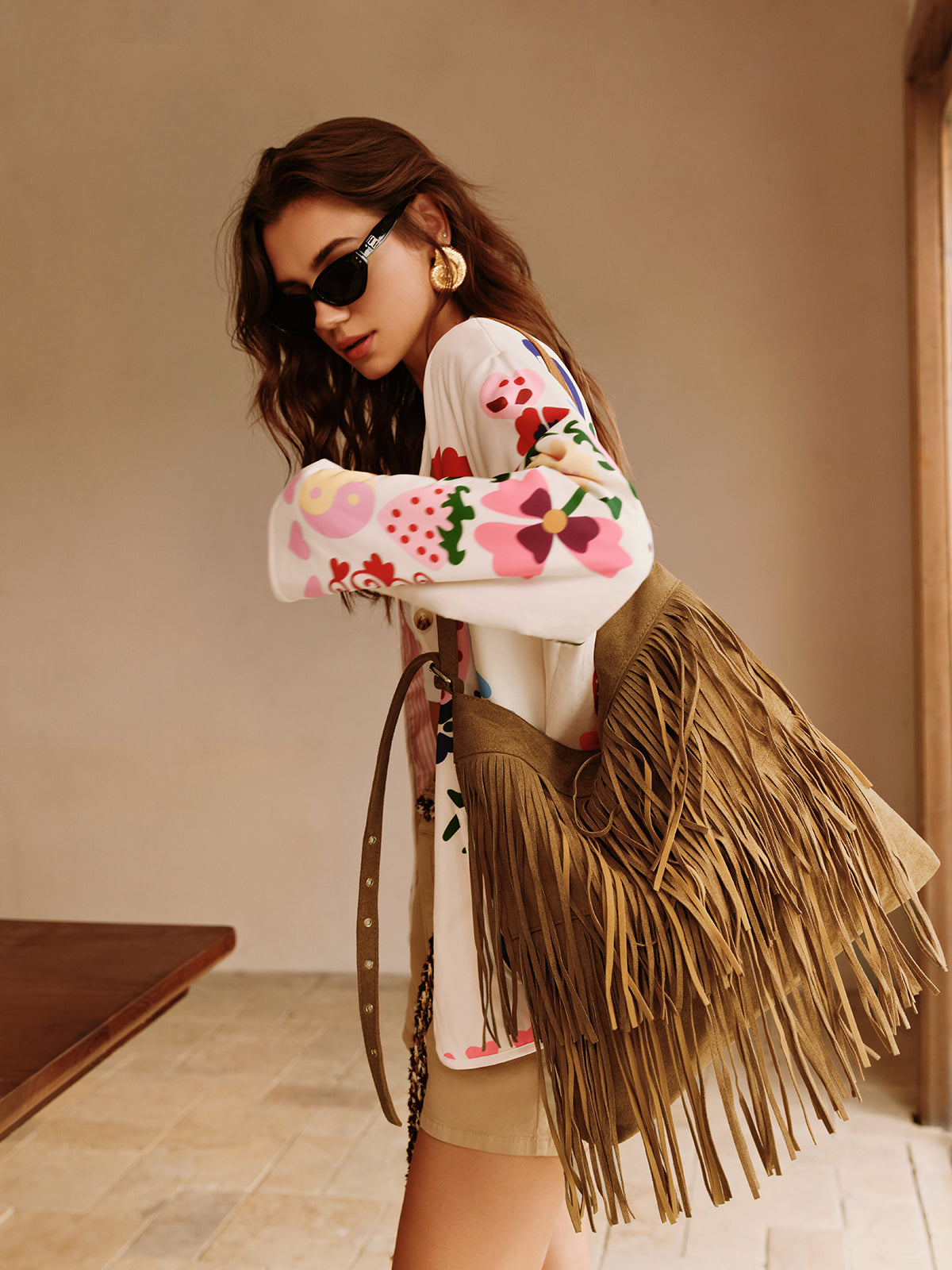 Boheme schoudertas met gesp-design en decoratieve kwast voor een stijlvolle uitstraling