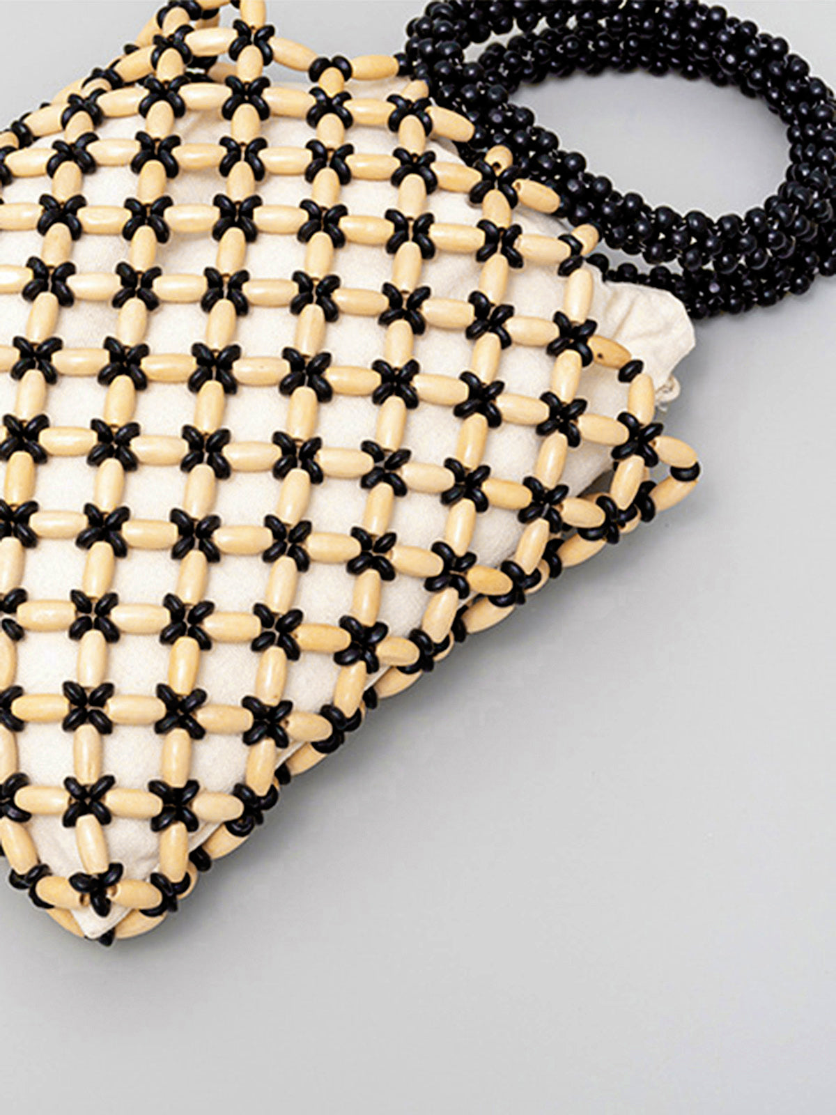 Chique Handtas met Contrastbinding en Mooie Houten Kralen