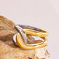 Elegante tweekleurige torsade ring