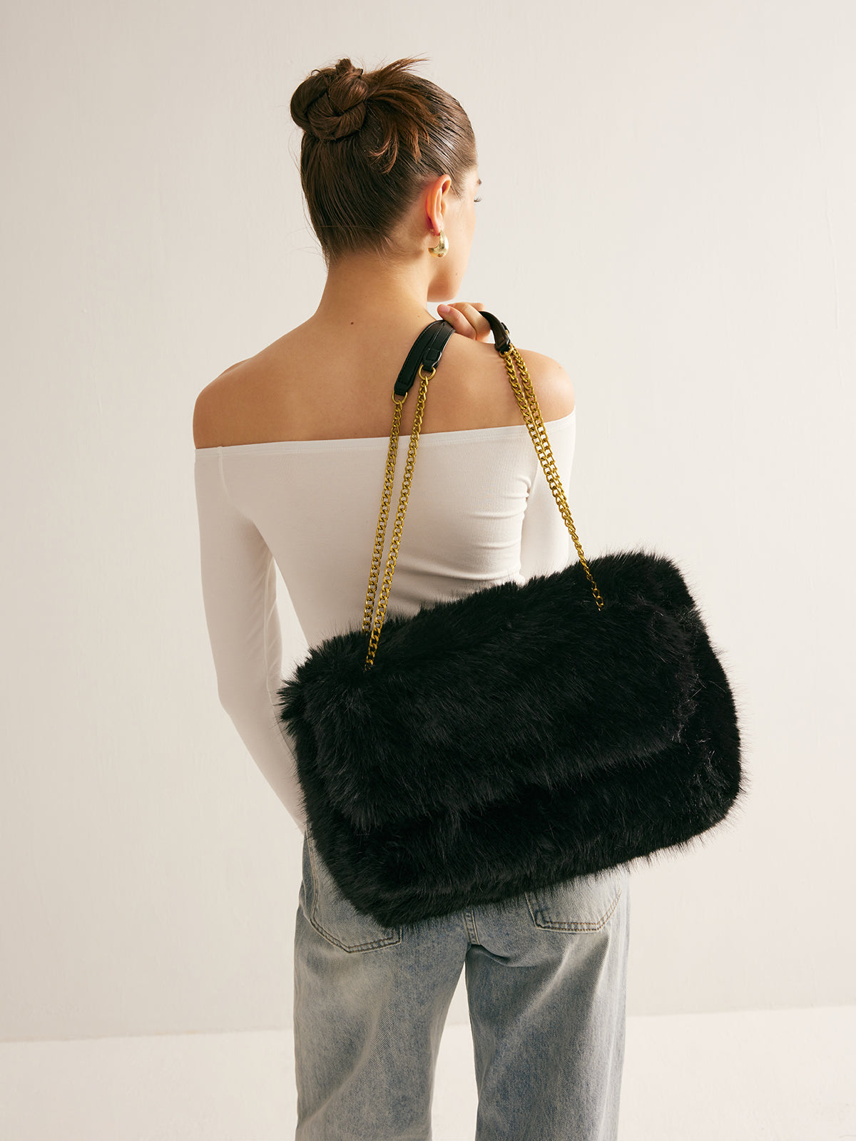 Elegante tas met grootruimte fuzzy-flap voor stijlvolle opbergruimte
