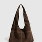 Elegante hobobag met knoopsluiting