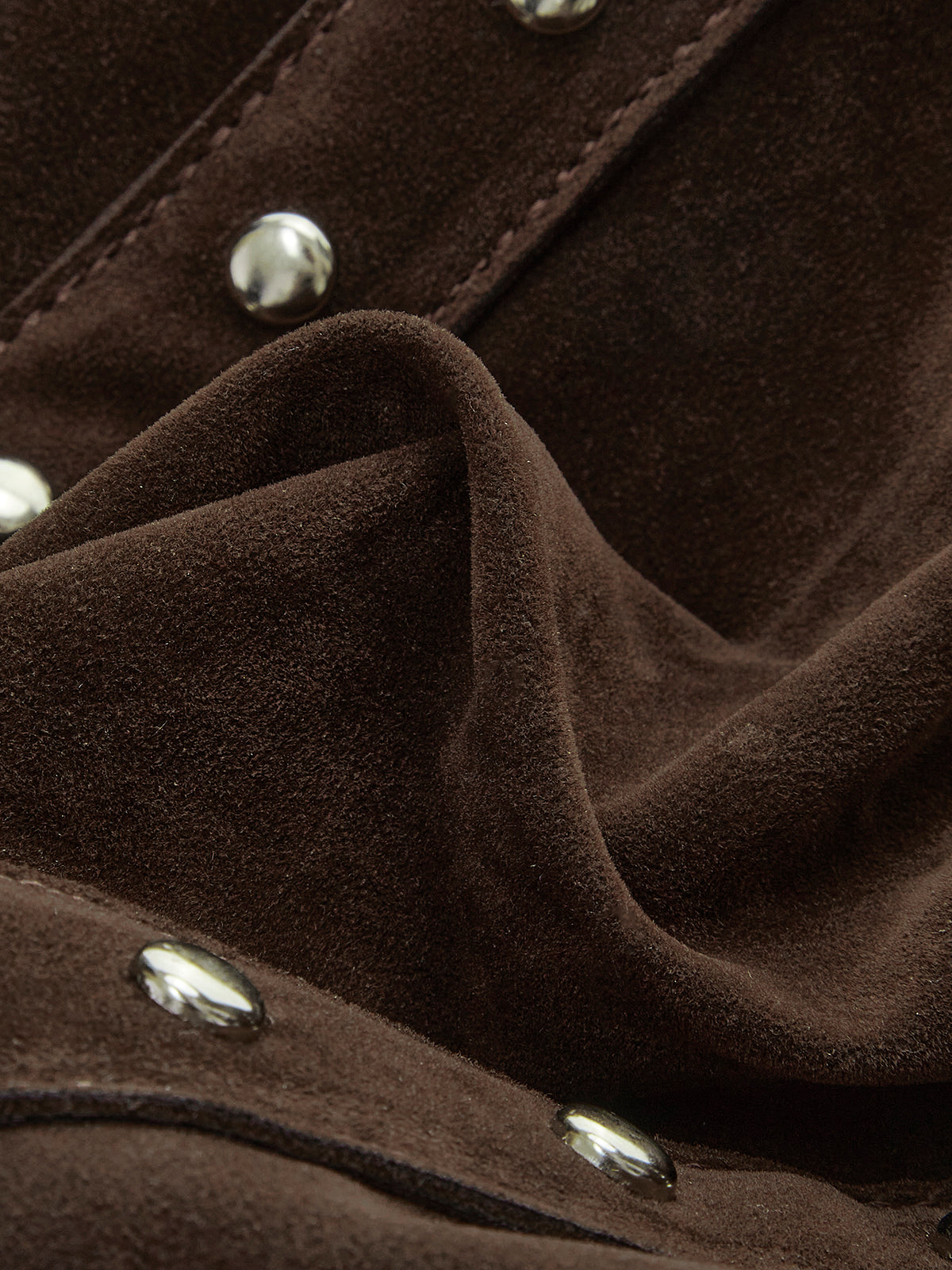 Schoudertas met knoop en gesp met spijkers