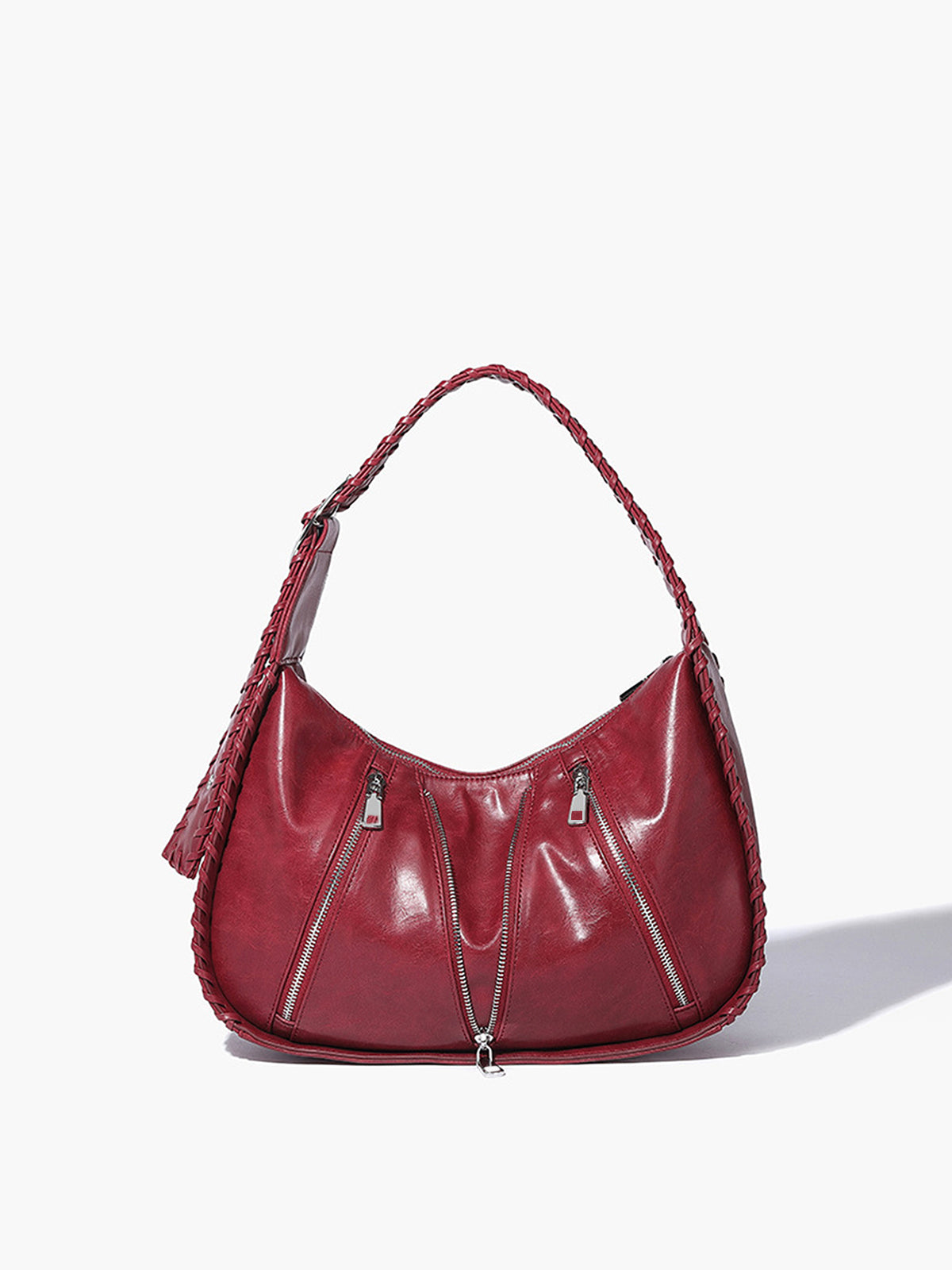 Trendy schoudertas met zachte ritssluiting en decoratief ontwerp onder de arm