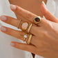 Set van 6 ringen met een mix van edelstenen en elegante texturen