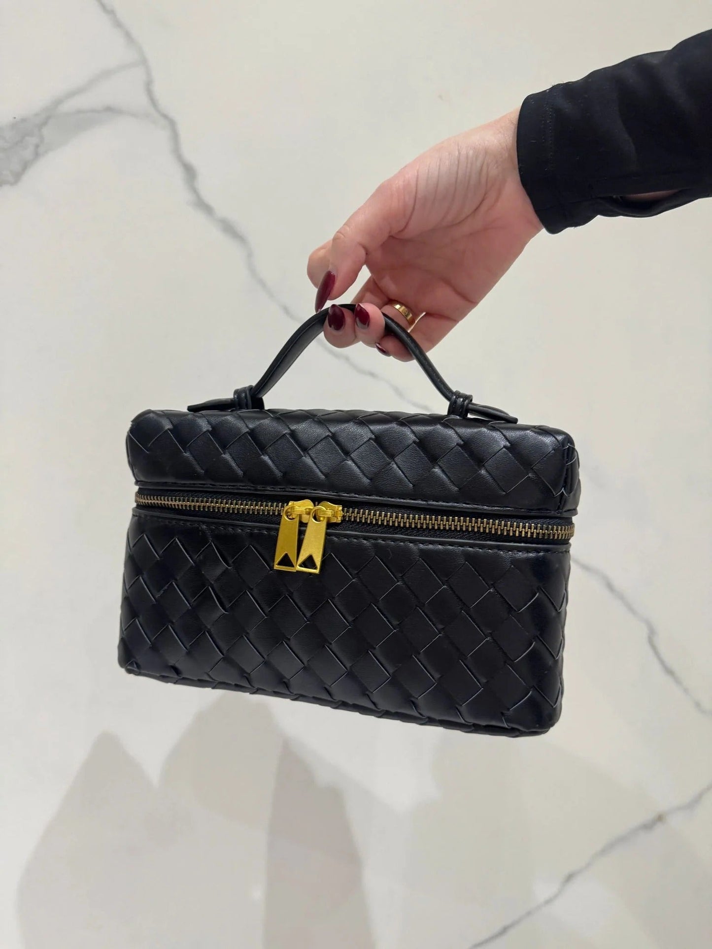 Elegante stoffen make-up- en accessoiretas in geweven ontwerp