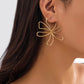 Stijlvolle Gouden Geometrische Bloem Stud Oorbellen - Elegant en Luxe Accessoire van Tommie