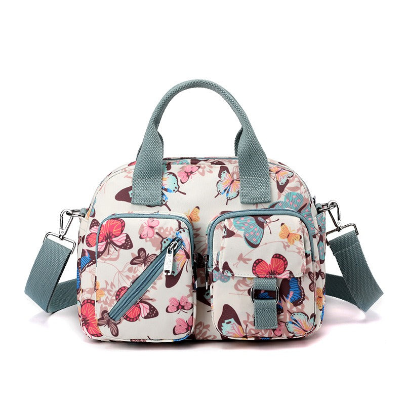 Damesschoudertas met meerdere vakken bloemenprint - Elora