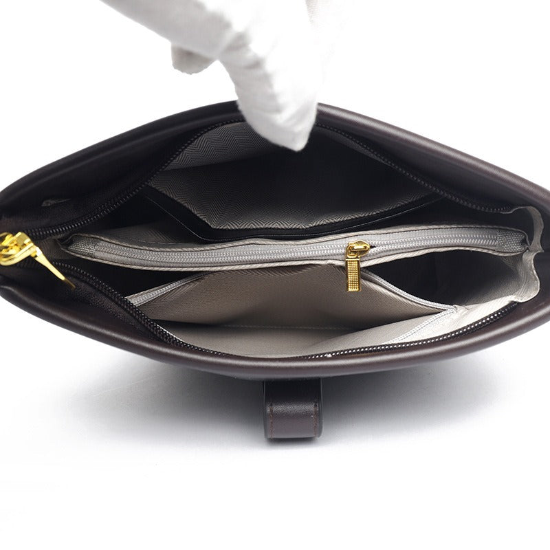 Schoudertas met leren effect en gestructureerd emmervormig ontwerp - Mireia